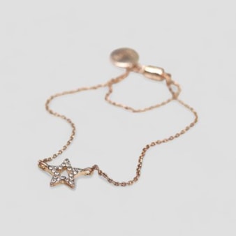 Rose gold plated fine chain and crystal star bracelet Rose gold plated fine chain and crystal star bracelet